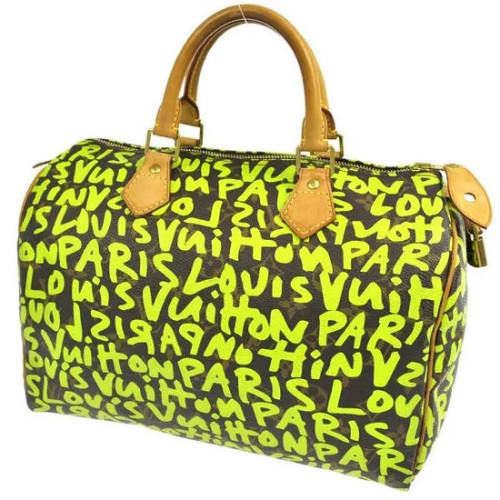 Louis Vuitton Graffiti Speedy 30 Gold Hardware, Graffiti Zip Wallet, And  Charm, 2009 Available For Immediate Sale At Sotheby's