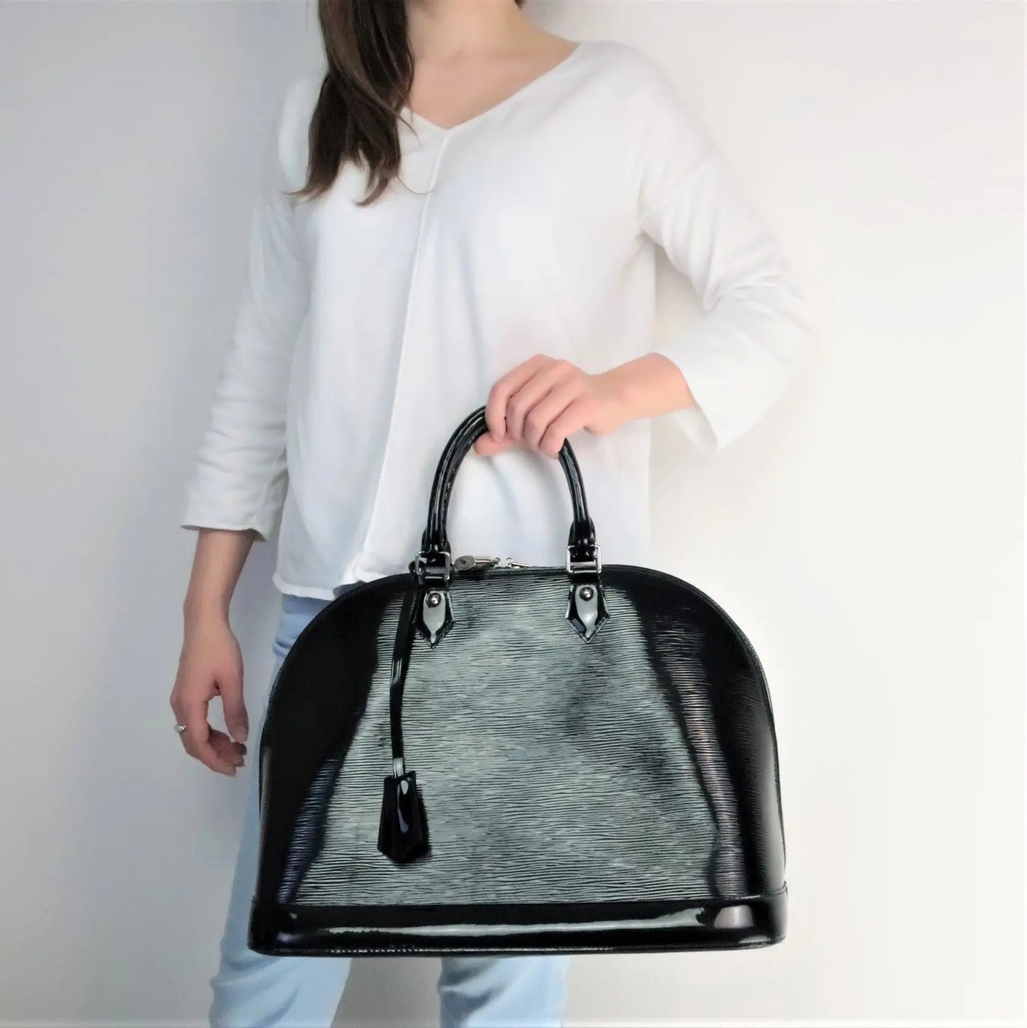Louis Vuitton Black Epi Electric Leather Alma MM Bag – Bagaholic