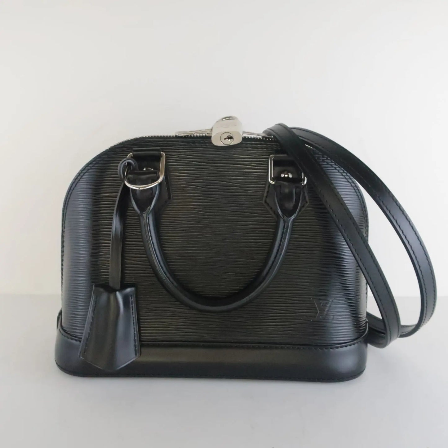 Néo alma leather crossbody bag Louis Vuitton Black in Leather