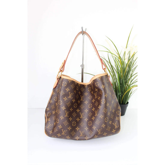 Delightful cloth handbag Louis Vuitton Brown in Cloth - 38607268