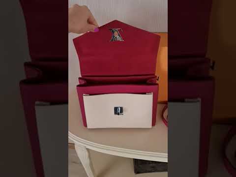 Load and play video in Gallery viewer, Louis Vuitton Fuchsia/Pink Pebbled Leather Mylockme Bag
