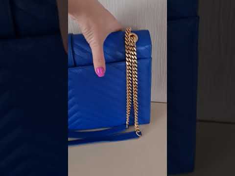 Load and play video in Gallery viewer, YSL Saint Laurent Blue Caviar Large Envelope Bag
